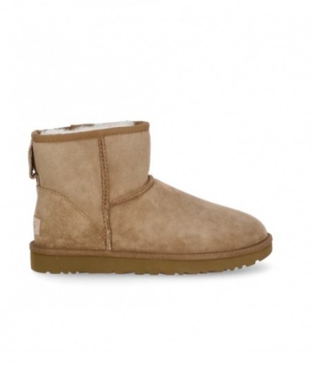 Stivaletti UGG in pelle scamosciata beige foderati in montone