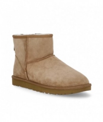 Stivaletti UGG in pelle scamosciata beige foderati in montone